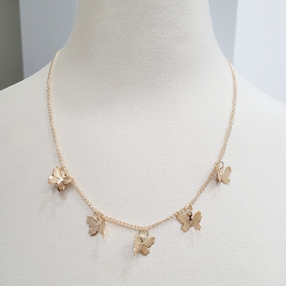 Brand New Gold Tone Butterflies Necklace